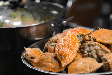Crab is cooked on the Asian night market. Sea food.