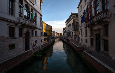 Fototapeta na wymiar Walk along the evening canals of Venice. Italy.