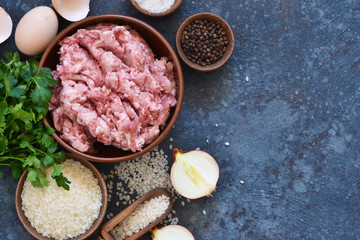 Cooking process of meat balls on the kitchen table. Ingredients for cooking meat. View from above.