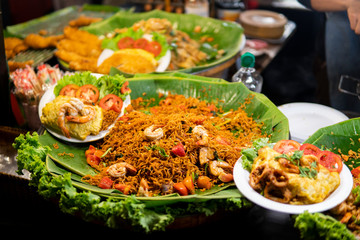 Asian street food at night food market.