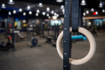 Gymnastic rings hanging at cross fitness box