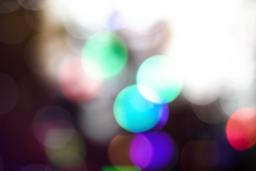 Beautiful Christmas background with garlands and bokeh. New year  multi-colored picture. Abstract photo image for design