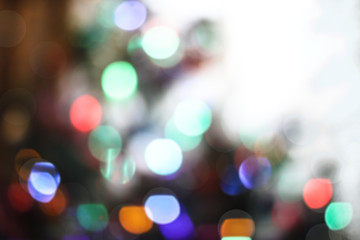 Beautiful Christmas background with garlands and bokeh. New year  multi-colored picture. Abstract photo image for design