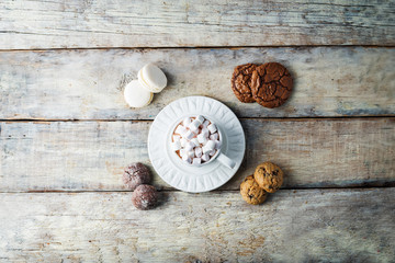 Christmas holidays wood background with Cup of Cocoa with marshmallow and Christmas decoration