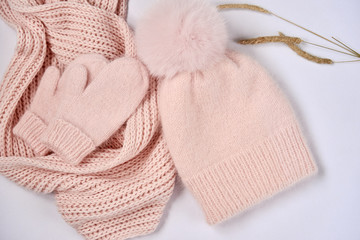Fototapeta na wymiar set of knitwear, hat snood and mittens