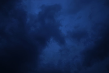 Naklejka na ściany i meble dark blue cloud with white light sky background and midnight evening time