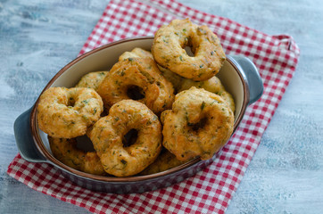 Traditional Turkish pastry : Pişi ; fried dough in oil with dill