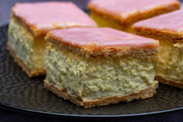 Tompoes or tompouce, iconic pastry in Netherlands and Belgium made from puff dough, icing, cream