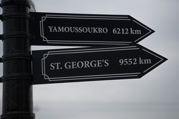 Pointer cities on the post, Yamoussoukro, St. George’s.