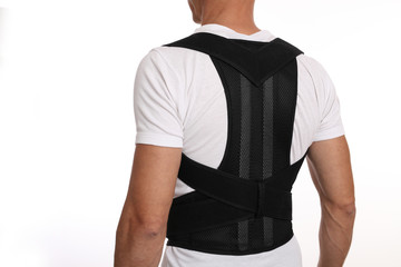 Man with posture corrector. Scoliosis, Kyphosis treatment - obrazy, fototapety, plakaty