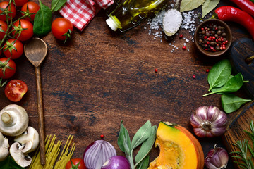 Culinary background with ingredients for making vegetarian dishes. Top view with copy space.