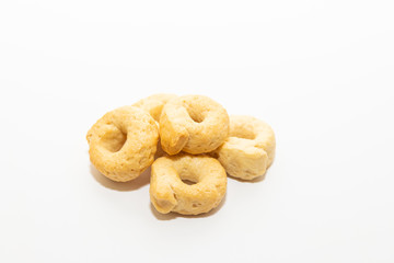 Tarallini bread sticks. Italian Taralli isolated on white background