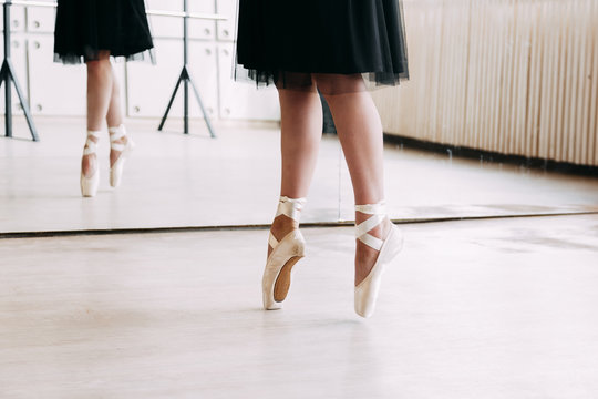 Closeup Of Ballerina Feet In Pointe Shoes