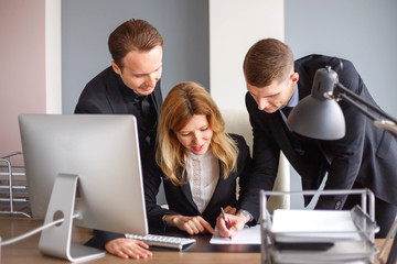 Business team at computer in the office