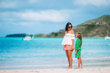 Portrait of little girl and mother on summer vacation