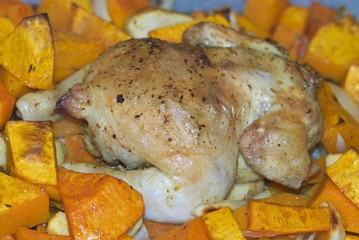 crispy baked chicken with pumpkin, apples and onions with curry sauce