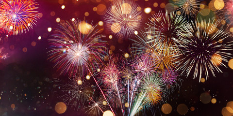 Colorful firework with bokeh background. New Year celebration, Abstract holiday background