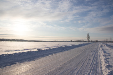 Snowy winter road. Winter fairy tale. Ride on a winter road.