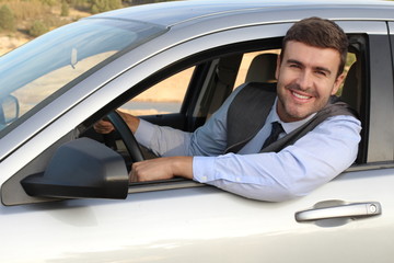Elegant male driver with a gorgeous smile