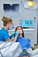 Woman In Visit At Dentis