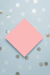 holiday card and  sparkles star confetti, for inserting text on a colored background top view. Minimalism. flatlay