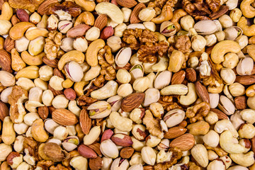 Background of the various nuts (almond, cashew, hazelnut, pistachio, walnut). Vegetarian meal. Healthy eating concept
