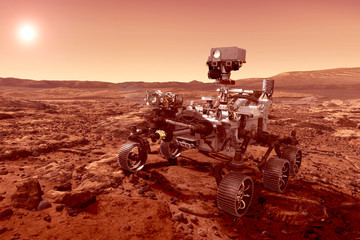 The rover explores the planet Mars, with the sun on the horizon. Elements of this image were furnished by NASA. - obrazy, fototapety, plakaty