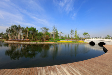 Double arch stone bridge and wooden platform