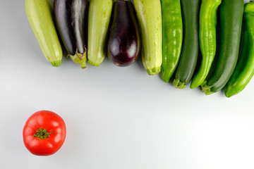 Fresh vegetables isolated, with peppers, eggplants , zucchini & tomato