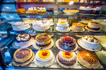 cakes in display case
