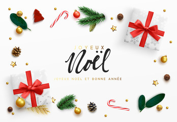Fototapeta na wymiar French text Joyeux Noel. Christmas background. Xmas decoration elements design, white gift box, gold ball, pine branches, candies. Chocolate and cane candy. surprise present flat top view.