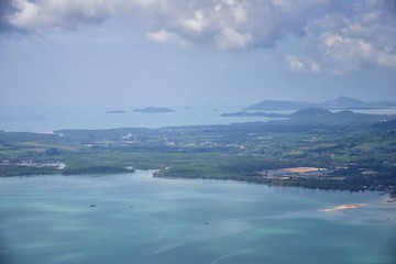 Phuket Thailand aerial drone bird's eye view photo of tropical sea, Indian Ocean, coast with Beautiful island south of Bangkok in the  Andaman Sea, near the Strait of Malacca. Asia. 