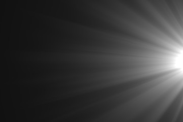 Lens flare light on back background.