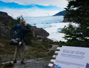  Hiker Taking a Picture of Glacier Grey Torres del Paine National Park, Chile
