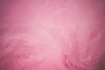 Pink color explosion. Colorful ink in water. Abstract background