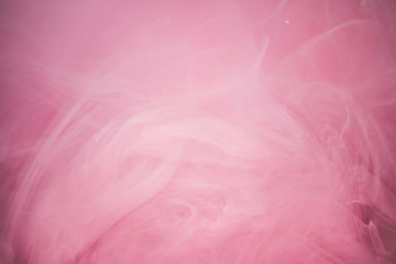 Pink color explosion. Colorful ink in water. Abstract background