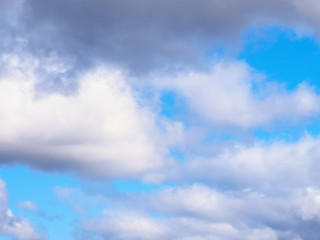 Obraz premium White clouds on a blue sky background