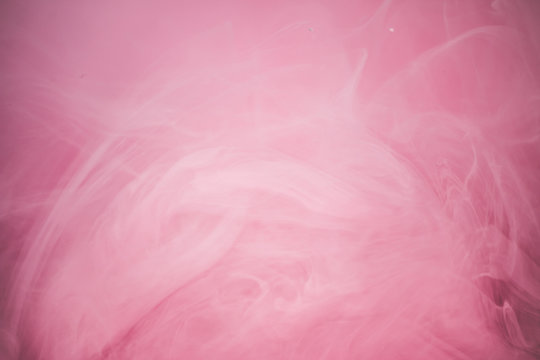 Pink color explosion. Colorful ink in water. Abstract background © Joshua