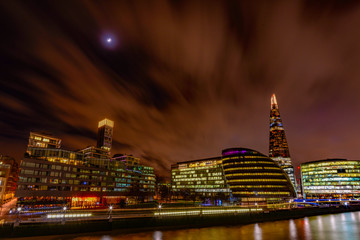 city of London one of the leading centers of global finance and Canary Wharf at the background.