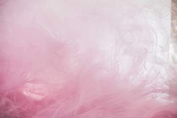 Pink color explosion. Colorful ink in water. Abstract background