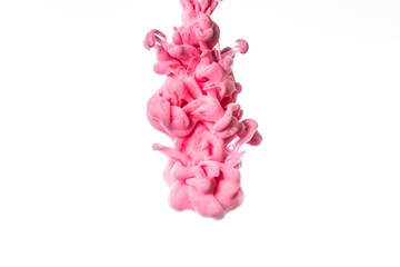 Colorful ink in water isolated on white background. Abstract pink paint splash.