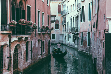 Panoramic view of Venice canal with historical buildings and gondolas