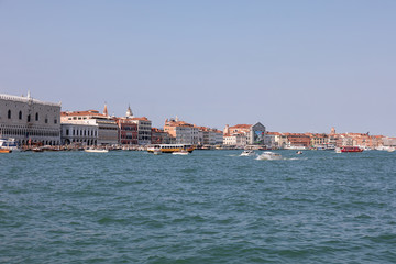 Fototapeta na wymiar Panoramic view of Venice coast with historical buildings and Laguna Veneta