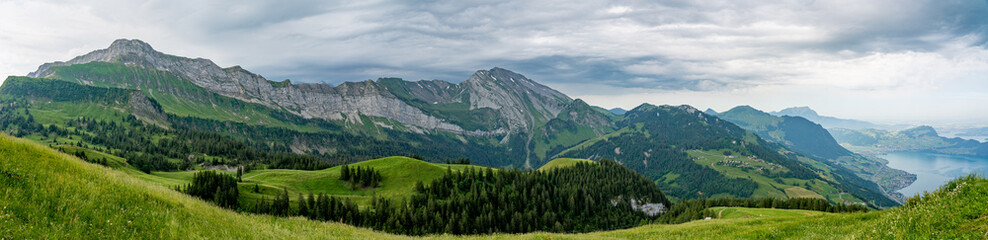 Fototapeta na wymiar Switzerland, Panoramic view on green Alps from Niederbauen