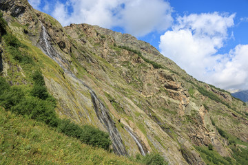 Panorama view of mountains scene in national park of Dombay, Caucasus, Russi