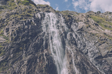 Panorama view of waterfall scene in mountains, national park of Dombay, Caucasus