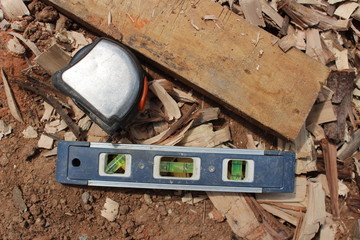 Tape for measuring distance and water level meter of equipment on the floor