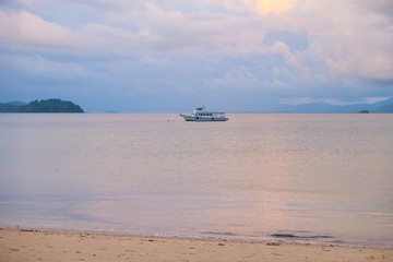 Small boat on the beach before sun rise