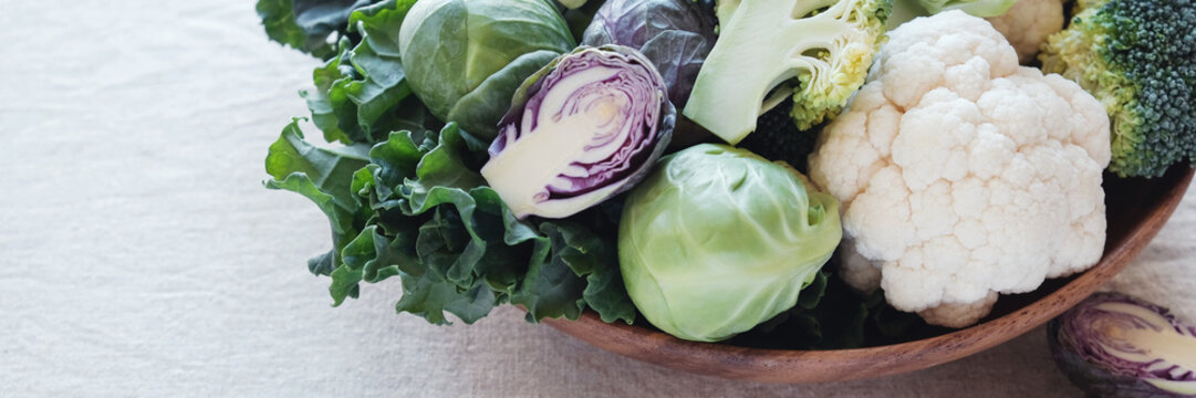 cruciferous vegetables in wooden bowl, reducing estrogen dominance, ketogenic diet, vegan plant based food