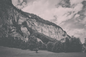 Fototapeta na wymiar View valley of waterfalls in national park of city Lauterbrunnen, Switzerland